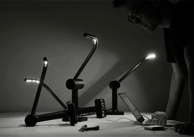 Yitong Sun working with a light simulation device.